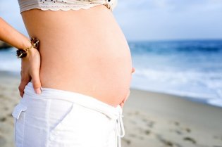 Когда начинает расти живот у беременных?